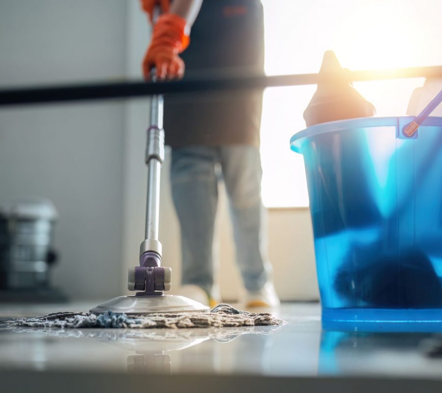 a-cleaning-woman-is-standing-inside-a-building-hol-2026-03-17-06-52-03-utc (1)