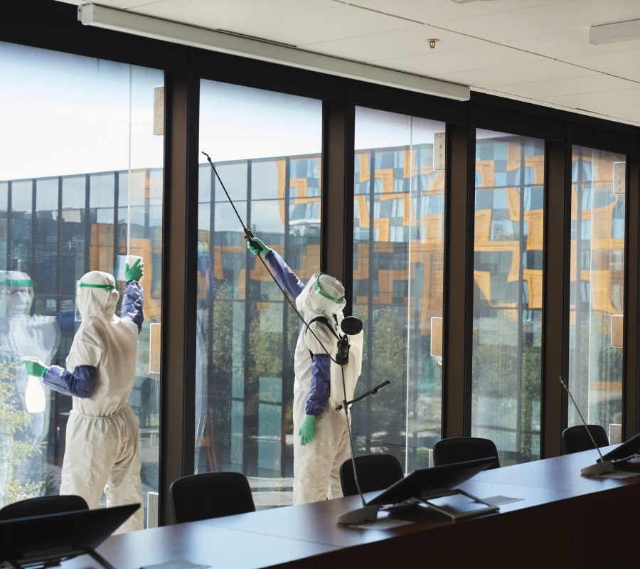 wide-angle-of-workers-disinfecting-windows-in-offi-2026-01-08-07-07-10-utc